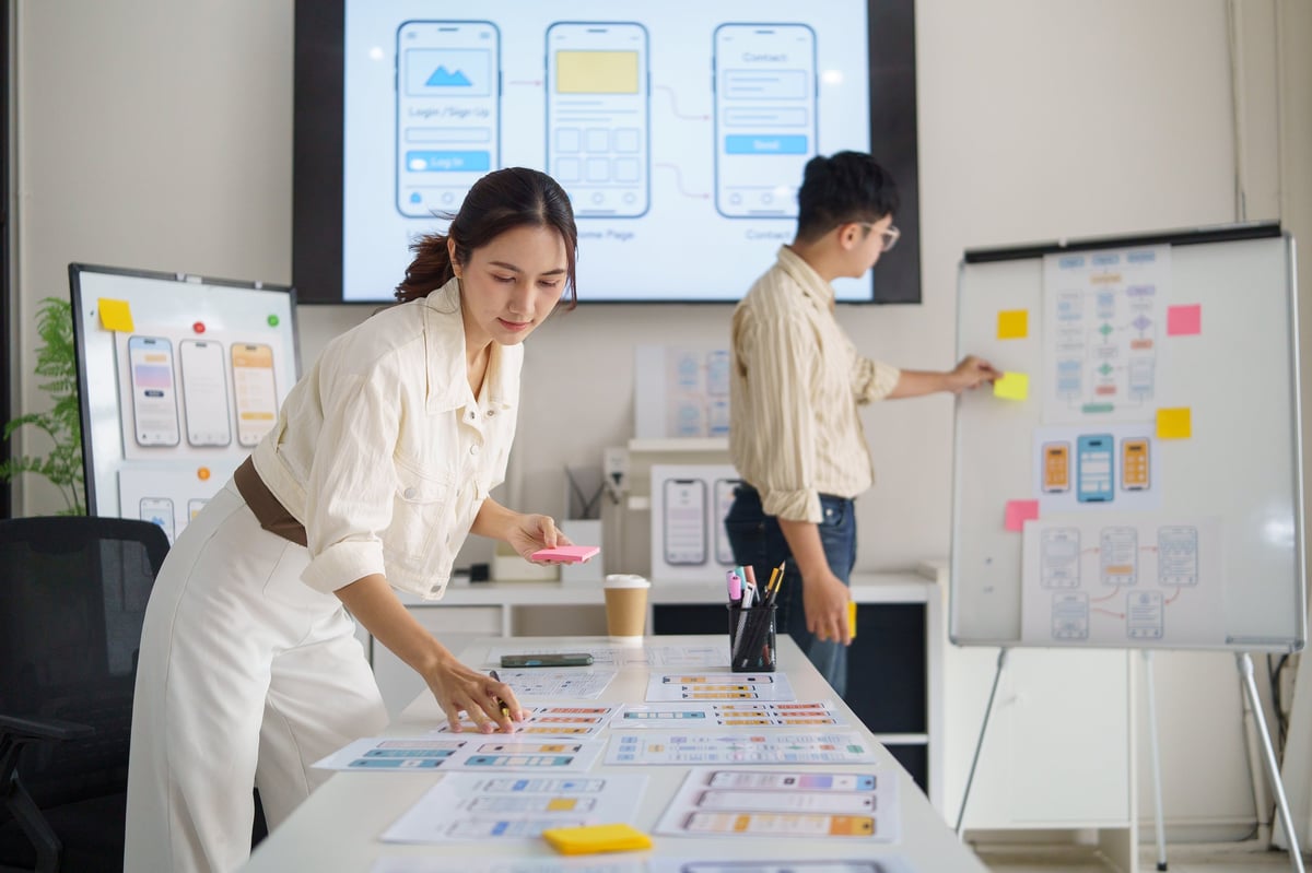 UX designer writing notes